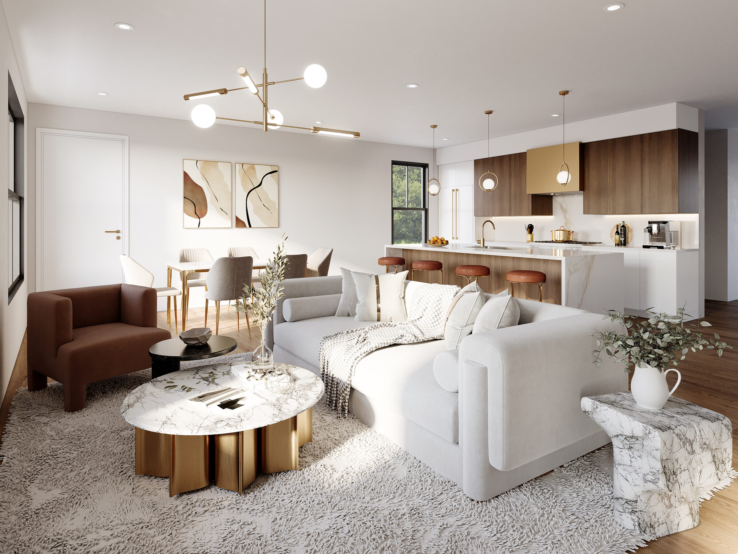 Open-concept living and kitchen with white sofa seating, coffee table, gold chandelier, and walnut-and-white cabinetry with island seating